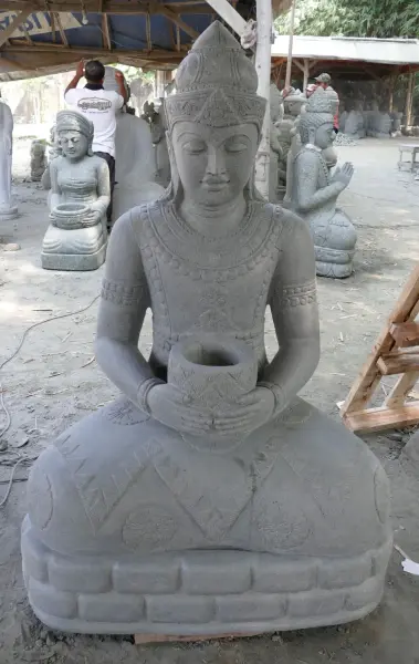 Product image of the product “Seated Buddha in Thai style made of Riverstone, Holds a vessel in his hands, H. 150cm. ”